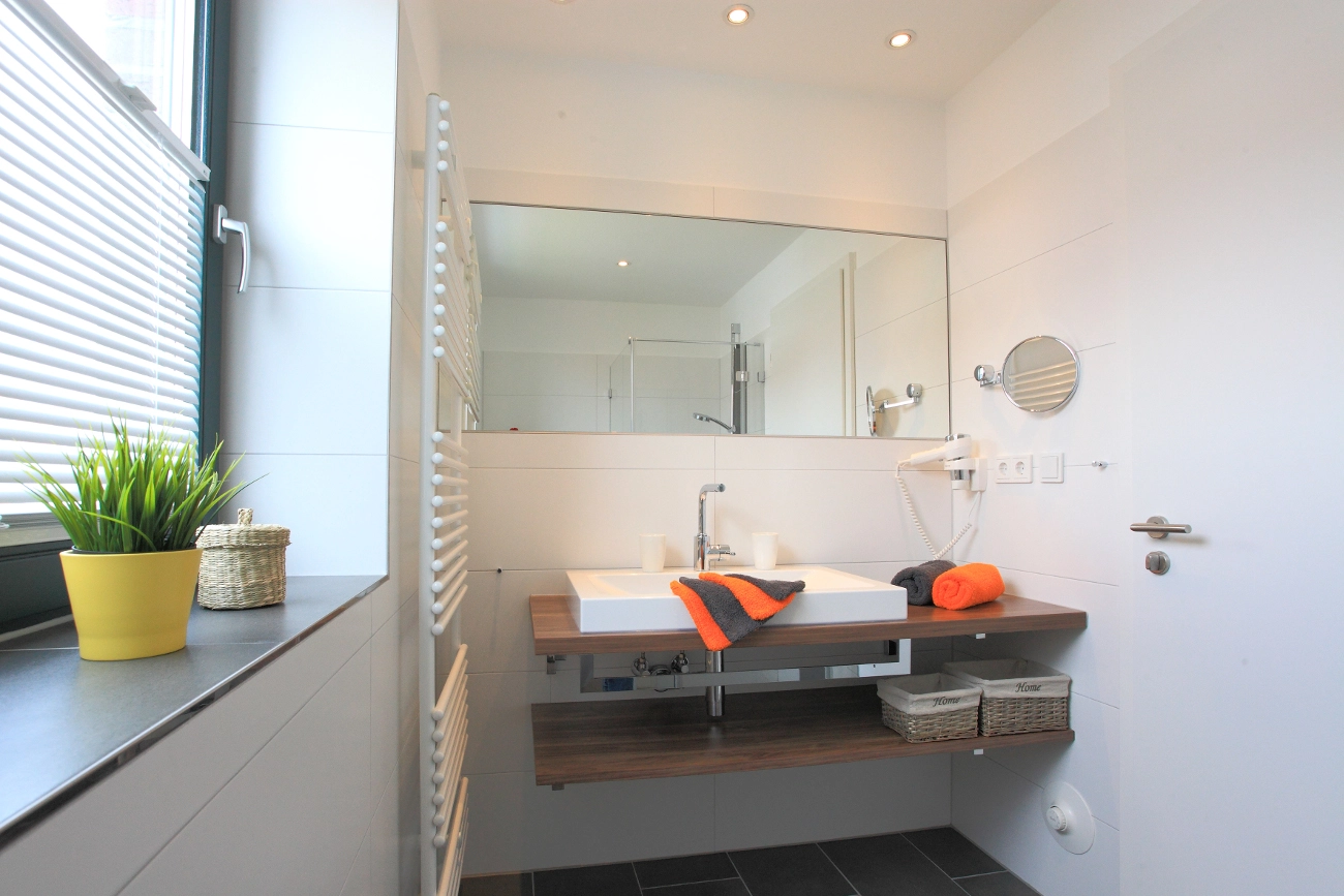 Badezimmer oben –
        Ferienhaus Windvogel