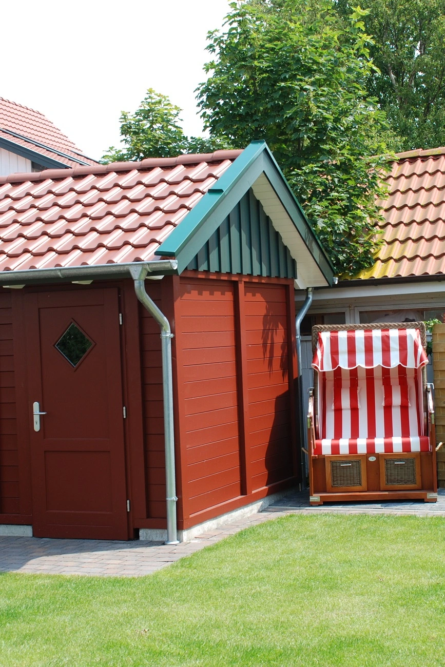 Strandkorb im Garten – Ferienhaus
        Windvogel